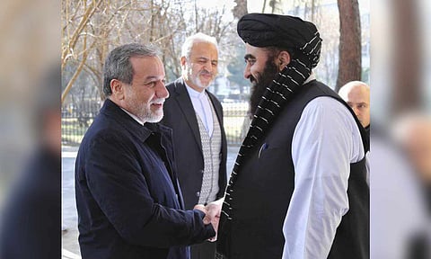 Iranian Foreign Minister Abbas Araghchi, left, is welcomed by Afghanistan's Foreign Minister Amir Khan Muttaqi in Kabul (AP)
