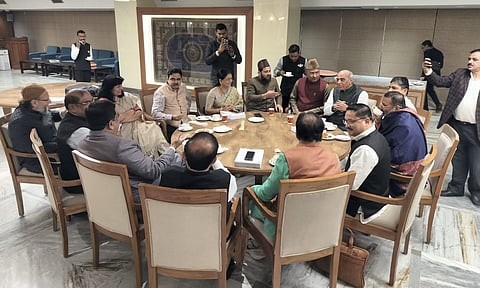 Members of the Joint Parliamentary Committee share a light moment after a meeting on the Waqf Amendment Bill (PTI)
