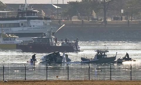 Search and rescue efforts are seen around a wreckage site in the Potomac River from Ronald Reagan Washington National Airport (AP)