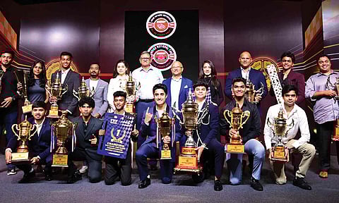 The 2024 National Racing champions with Arun Mammen, Vice-Chairman and Managing Director, MRF Ltd (fifth from right) and MMSC president Ajit Thomas (sixth from left) 