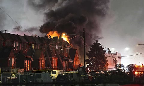 First responders work the scene after a small plane crashed in Philadelphia (AP)