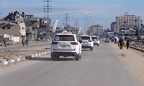 Red cross convoy drives towards Gaza City ahead of expected hostage release (AP)