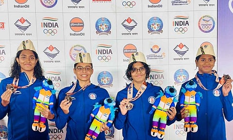 The Tamil Nadu 4x200 freestyle event team that won the bronze medal