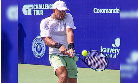 Jay Clarke returns a serve during his match (Hemanathan M)
