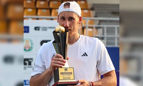 Frenchman Kyrian Jacquet pose with the trophy (Photo: Hemanathan M)