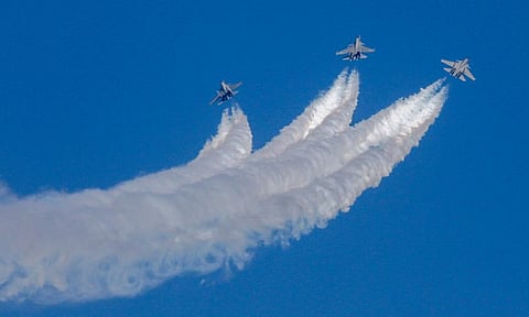 Aircraft fly past during the full dress rehearsal of the Air Show-2025 at the Yelahanka Air Force Station in Bengaluru (PTI)