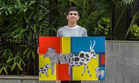 Sai Akhil Anand with his artwork