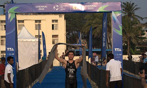Francesco Basilico crossing the finish line at the race 