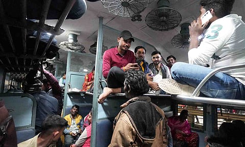 Passengers are seen in a crowded coach of a special train bound for Prayagraj at the New Delhi Railway Station (PTI)
