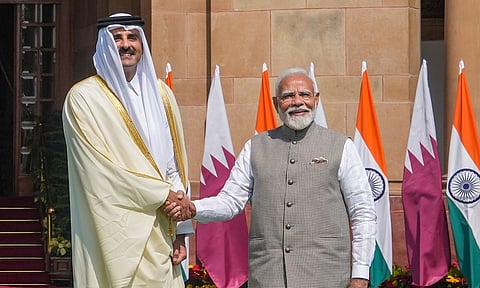 Prime Minister Narendra Modi and Amir of Qatar Sheikh Tamim Bin Hamad Al Thani during exchange of MoU documents after a meeting, at the Hyderabad House in New Delhi (PTI)