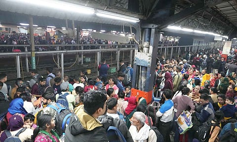  Heavy rush of passengers to catch a train for Mahakumbh, at the New Delhi railway station (PTI)