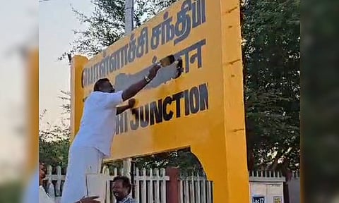 Pro-Tamil activists blackened the Hindi words painted in the nameboard at the railway station 
