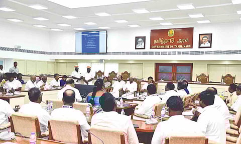 A meeting in progress between ministers and govt employees