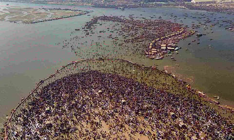 Devotees gather to take a holy dip at Sangam during the ongoing Maha Kumbh Mela 2025, in Prayagraj, Monday (PTI)