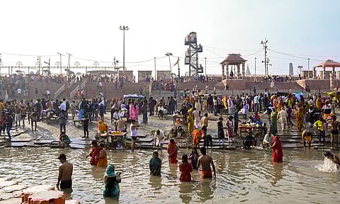 Devotees take a dip in Saryu river on the occasion of Maha Shivratri, in Ayodhya (PTI)