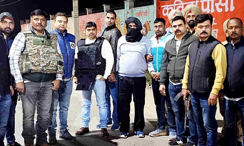 Security personnel after the arrest of an 'active terrorist' of Babbar Khalsa International (BKI) with alleged links to Pakistan's ISI in a joint operation by Uttar Pradesh STF and Punjab Police (PTI)