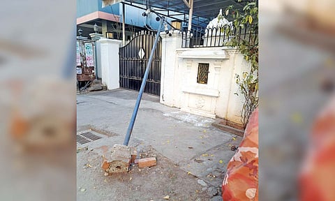 A damaged CCTV camera pole on Bharathi Road 