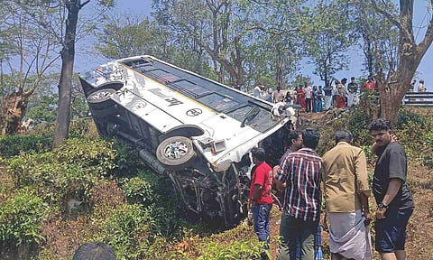 The tourist vehicle which fell along the road side