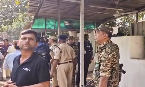 Gathering during raids by the Enforcement Directorate (ED) on premises linked to Chaitanya Baghel, son of former Chhattisgarh Chief Minister and Congress leader Bhupesh Baghel, in connection with an alleged liquor scam, in Bhilai, Monday (PTI) 