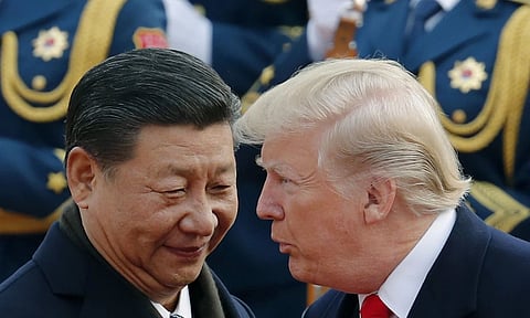 Chinese President Xi Jinping with US President Donald Trump (AP)