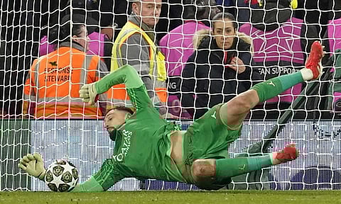PSG's goalkeeper Gianluigi Donnarumma saves a penalty from Liverpool's Curtis Jones (AP) 