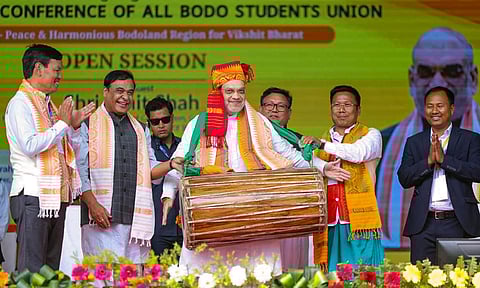 Union Home Minister Amit Shah with Assam Chief Minister Himanta Biswa Sarma and Bodoland Territorial Council (BTC) Chief Pramod Boro during the 57th annual conference of the All Bodo Students Union, at Dotma in Kokrajhar distrcit (PTI)
