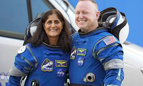 NASA astronauts Suni Williams, left, and Butch Wilmore stand together for a photo enroute to the launch pad (AP)