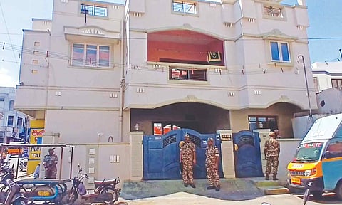 CRPF personnel standing guard as ED officials conduct raid at the house of Razik in Coimbatore on Thursday