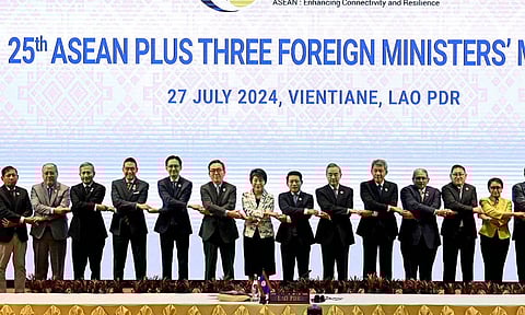 Foreign ministers pose for a group photo at the 25th Asean Plus Three Foreign Ministers’ Meeting 