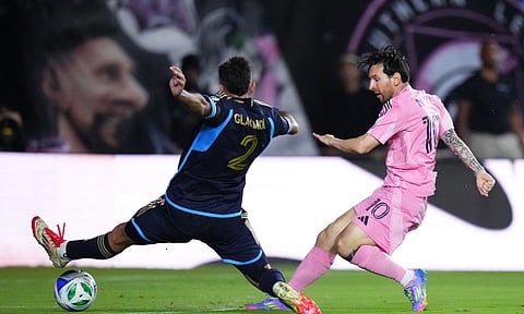 Lionel Messi shoots to score the winner 