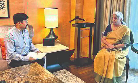 Expelled AIADMK leader KC Palanisamy interacting with Finance Minister Nirmala Sitharaman on Sunday