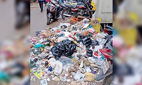 Heaps of garbage lying uncleared on a street in Park Town