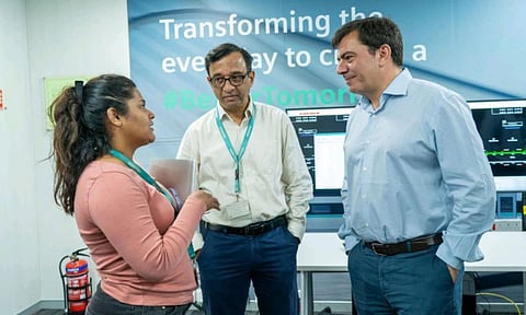 Augustin Escobar interacting with a Siemens staff during his India visit two weeks ago 