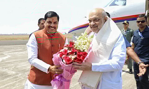 Union Home Minister Amit Shah being welcomed by Madhya Pradesh Chief Minister Mohan Yadav upon his arrival in Bhopal (PTI)