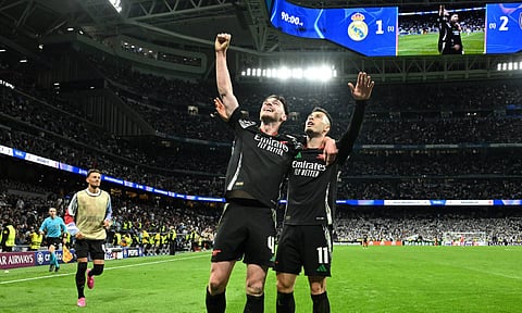 Gabriel Martinelli celebrates with Declan Rice after scoring