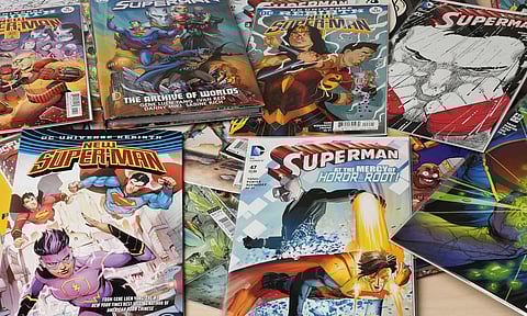 Comic books are displayed in Gene Yang's home (AP)