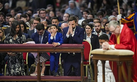 U.S. Vice President JD Vance and his wife Usha Vance, left, with their daughter Mirabel, partially hidden and son Vivek attend a Good Friday service (AP)