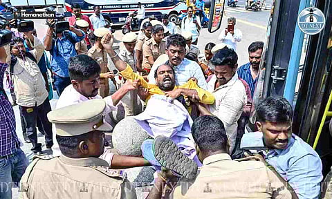 A TARATDAC member being forcefully arrested by police (Photo credit: Hemanathan M)