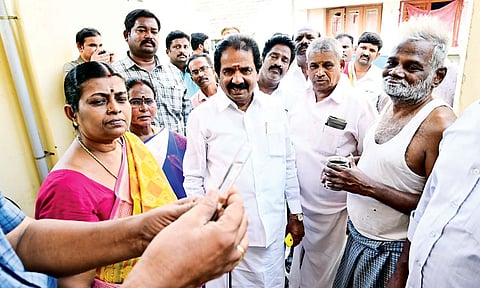 Mayor Mu Anbalagan inspects the quality of drinking water at Woraiyur in Tiruchy on Wednesday 