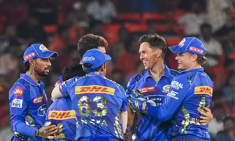 Mumbai Indians' Trent Boult with teammates (PTI)