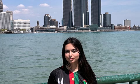 Yara Alfaqeeh, 20, stands along the Windsor, Ontario, Canada side of the Detroit River on Wednesday, April 23, 2025. (AP)