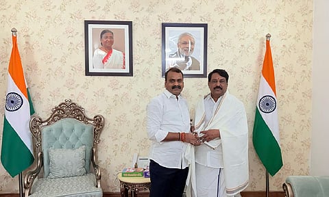 BJP state president Nainar Nagenthran with Union Minister of State for Information and Broadcasting L Murugan (X)