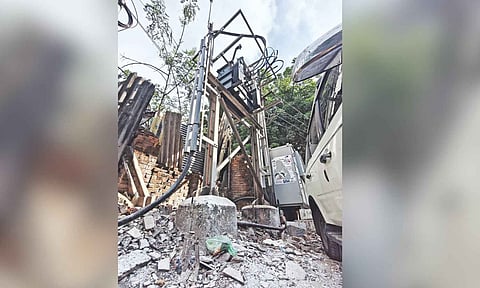 Cables haphazardly connected to a transformer in Muthamizh Nagar posing threat to locals and passersby