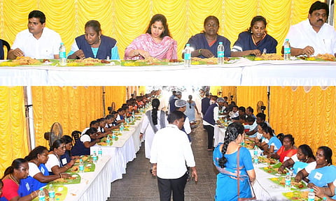Mayor R Priya eating with cleanliness workers in a special event was held at the GCC auditorium in Ripon Building (X)