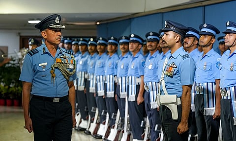 Air Marshal Narmdeshwar Tiwari inspects a guard of honour before taking charge as the new Vice Chief of the Air Staff, in New Delhi, Friday, May 2, 2025 (PTI) 