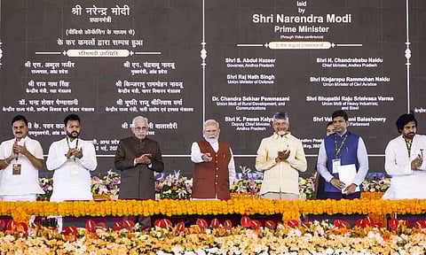 Prime Minister Narendra Modi with Andhra Pradesh Governor S. Abdul Nazeer and Chief Minister N. Chandrababu Naidu during the inauguration and foundation stone laying ceremony of various development projects, in Amaravati, Andhra Pradesh (PTI) 