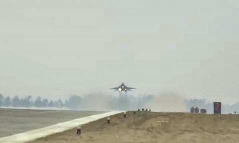 A fighter plane prepares to touch down as Indian Air Force conducts trial on the airstrip of the under-construction Ganga Expressway in Shahjahanpur, Friday, May 2, 2025 (PTI)