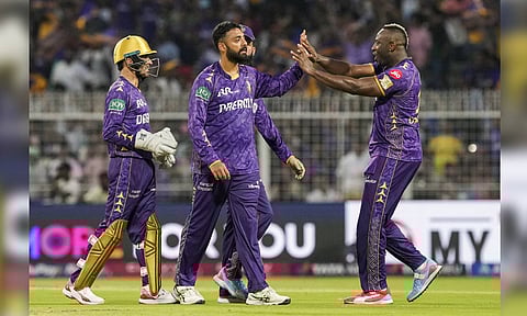 Kolkata Knight Riders' Varun Chakravarthy celebrates with teammates after taking the wicket of Rajasthan Royals� Dhruv Jurel during an Indian Premier League (IPL) 2025 T20 cricket match between Kolkata Knight Riders and Rajasthan Royals, at the Eden Gardens, in Kolkata, West Bengal, Sunday, May 4, 2025 (PTI) 