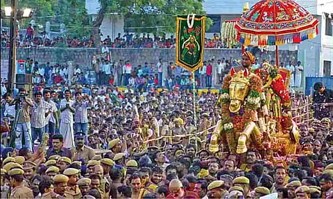 File photo of ‘Azhagar Aatril Irangudhal’ ceremony in Madurai, a 10-day temple festival in which lakhs of devotees participate