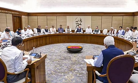 Prime Minister Narendra Modi with Defence Minister Rajnath Singh, Union Home Minister Amit Shah, Union Ministers Nitin Gadkari, JP Nadda and others during a Cabinet meeting following 'Operation Sindoor', in New Delhi. (PMO via PTI)